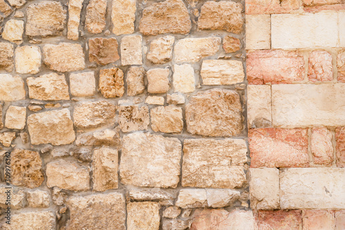 Stone wall texture. Old cobble stoned background. Details. Jerusalem, Israel