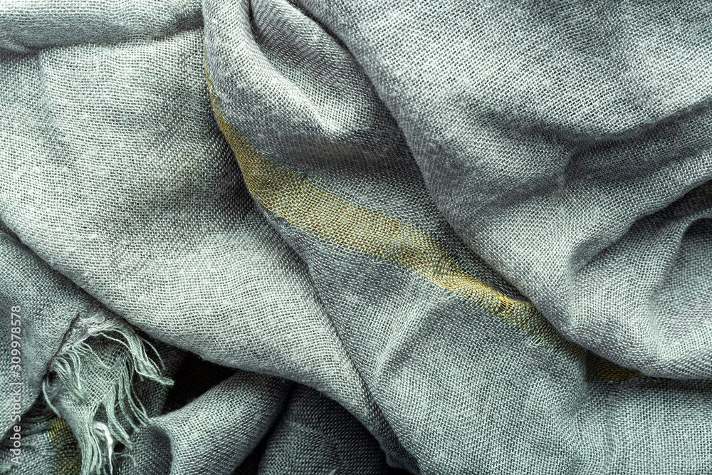 Wave gray textile material texture as a background. Grey textile pattern for design in fashion as abstract background. Abstract grey fabric background. Wave gray textile material texture as a background. Grey textile pattern for design in fashion as abstract background. Abstract grey fabric background.