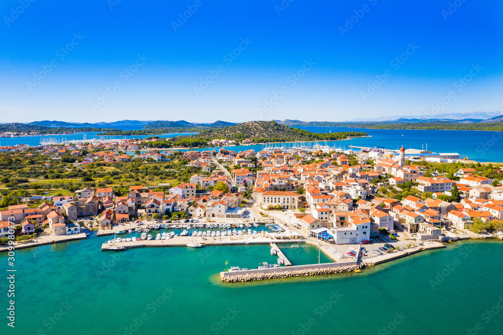 Obraz premium Adriatic coast in Dalmatia, Croatia, beautiful island of Murter and town of Betina from air, popular touristic destination