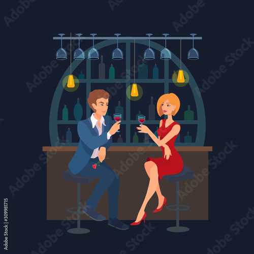 Couple sitting at the bar counter, raise wine glasses, looking at each other. A handsome man holds a rose flower. Young adult beautiful blonde girl in a red dress smiling. 