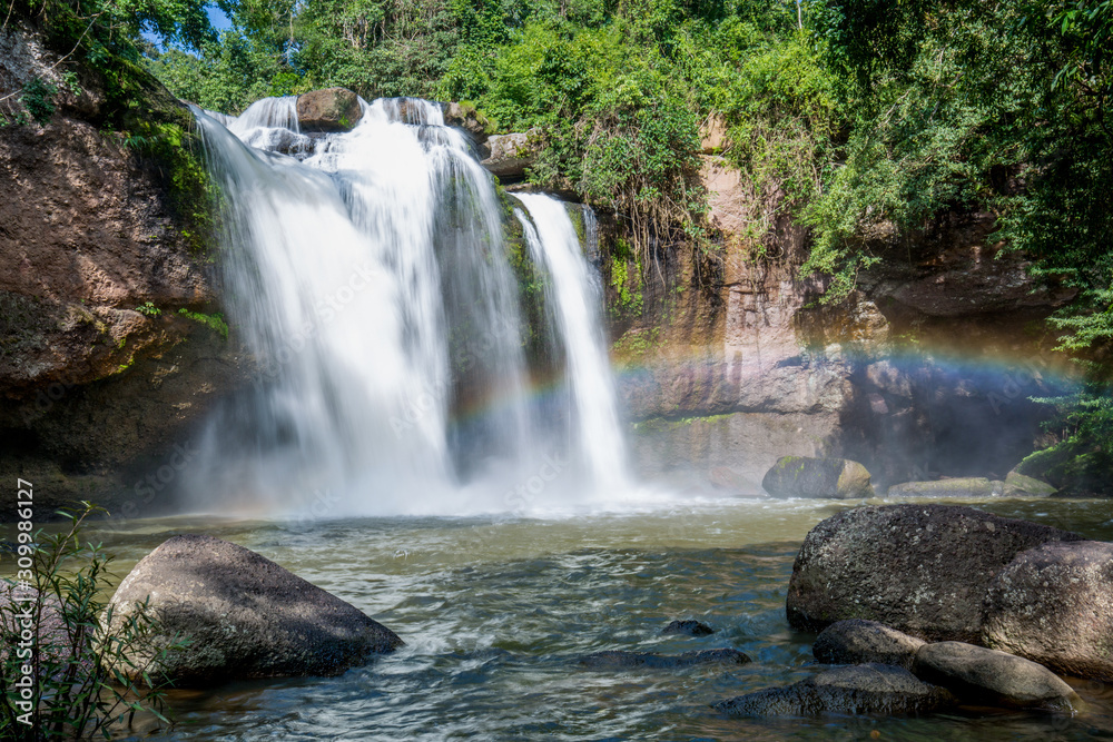 Huaew suwat waterfall with rainbow in khao yai national park from Thailand Huaew suwat waterfall with rainbow in khao yai national park from Thailand