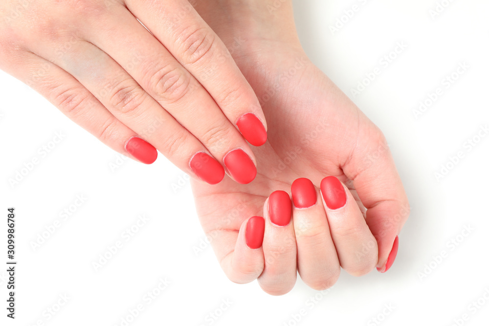 Woman hands, stylish red manicure isolated on white background, top view. Healthcare concept Woman hands, stylish red manicure isolated on white background, top view. Healthcare concept