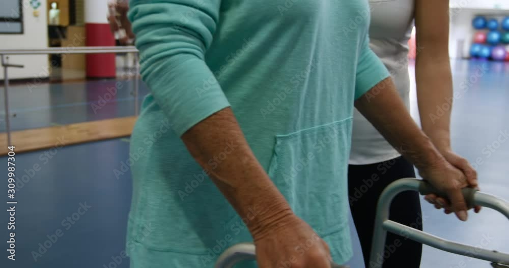 Woman exercising with a prosthetic leg Woman exercising with a prosthetic leg