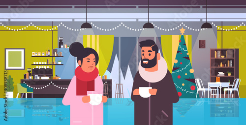 couple drinking coffee and discussing during meeting in restaurant with decorated fir tree merry christmas happy new year winter holidays concept modern cafe interior flat portrait horizontal vector
