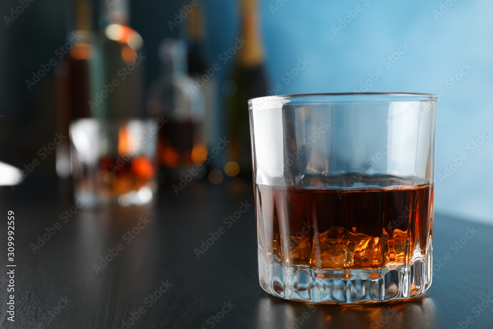 Glasses of whiskey on bar counter, close up and space for text Glasses of whiskey on bar counter, close up and space for text