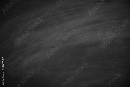 Abstract texture of chalk rubbed out on blackboard or chalkboard , concept for education, banner, startup, teaching , etc.