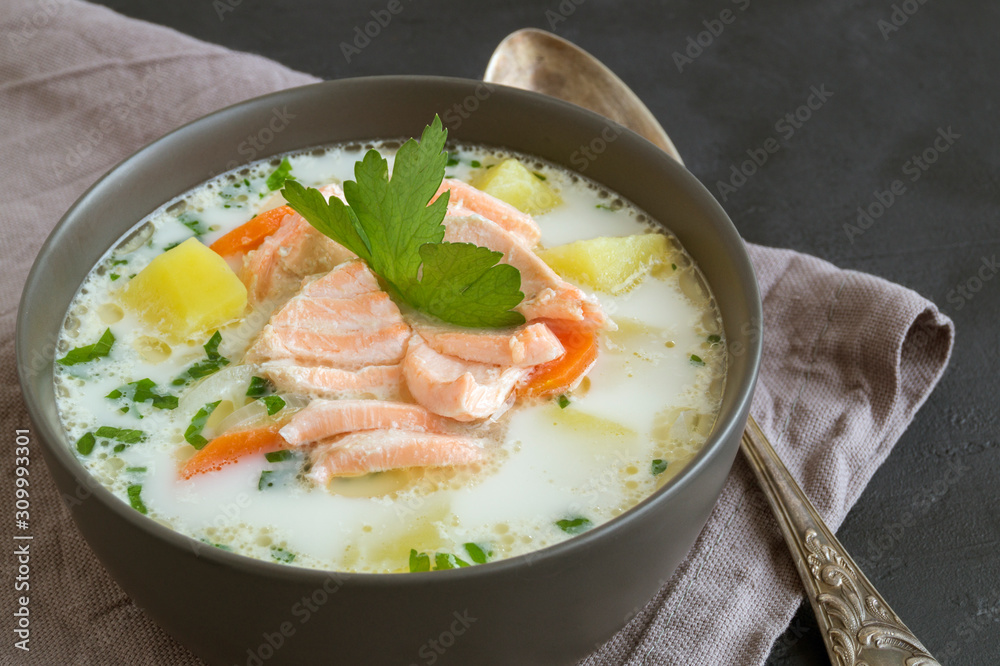 traditional salmon soup with vegetables and cream. traditional salmon soup with vegetables and cream.