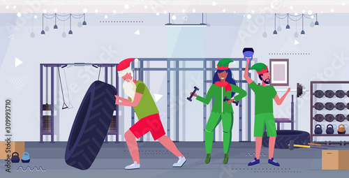 santa claus flipping tire elves exercising with dumbbells and kettlebell training workout healthy lifestyle concept christmas new year holidays modern gym interior horizontal full length vector