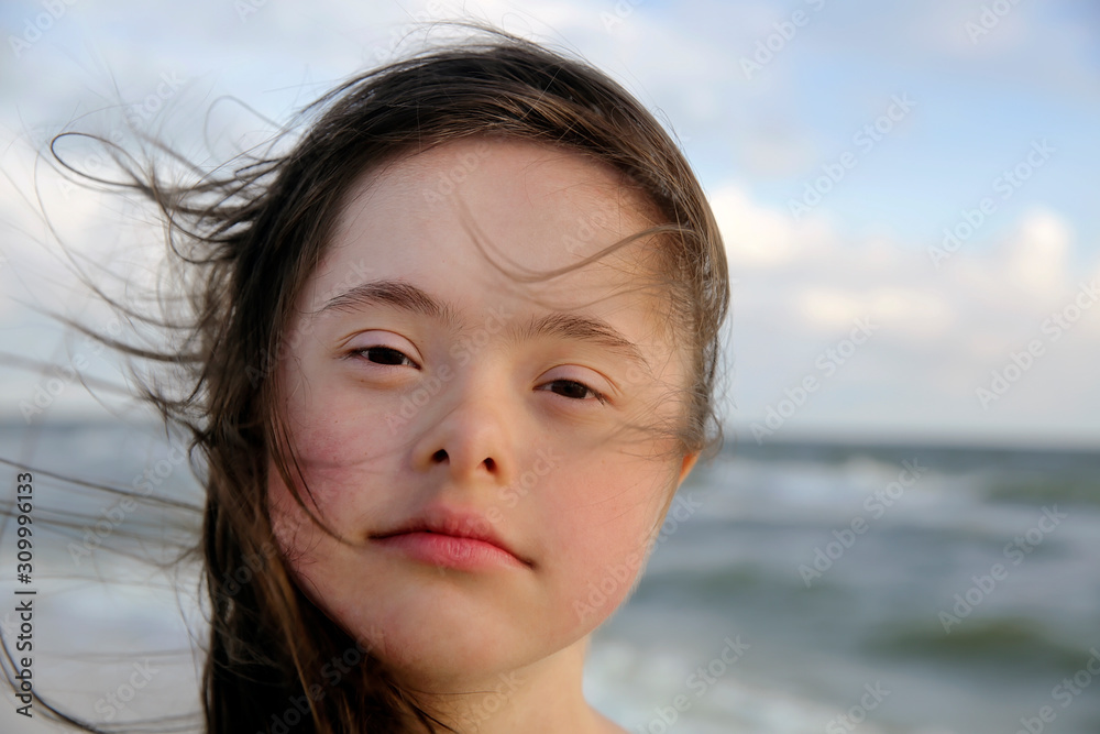 Portrait of the girl on background of the sea Portrait of the girl on background of the sea