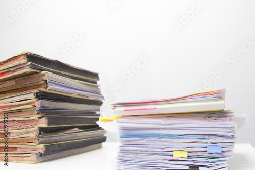 Business documents with charts growth, Book and pen. Workplace on table in office