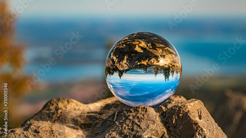 Crystal ball alpine autumn or indian summer landscape shot at the famous Kampenwand, Aschau im Chiemgau, Bavaria, Germany