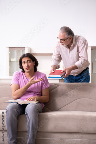 Young student and his father