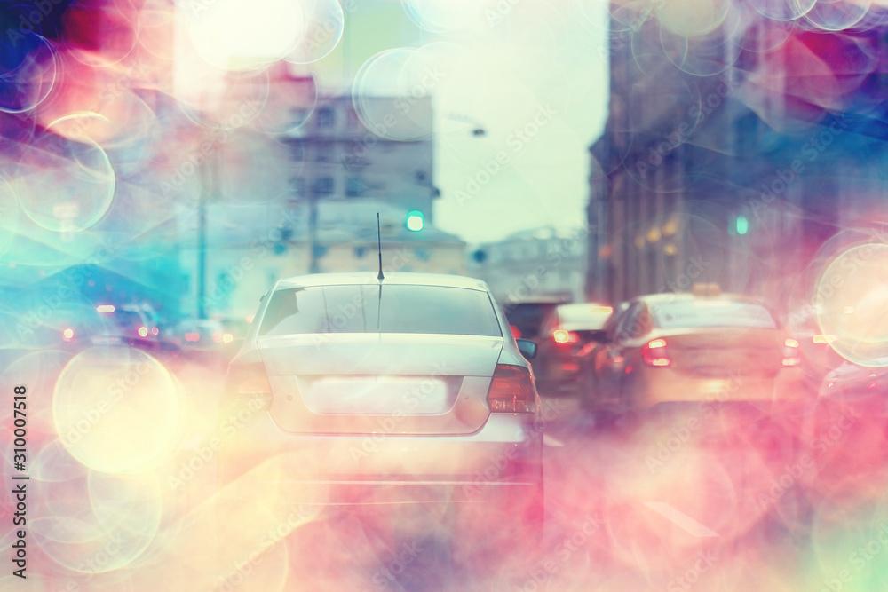 abstract traffic jam background on road / bokeh, view of transport, auto on the road in blurred background, cars, rear light, stop signal