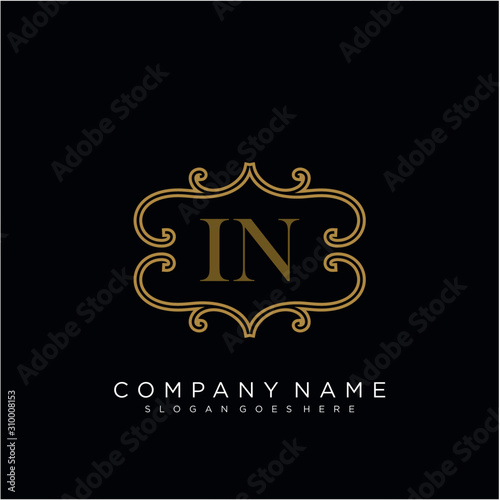 Initial letter IN logo luxury vector mark  gold color elegant classical