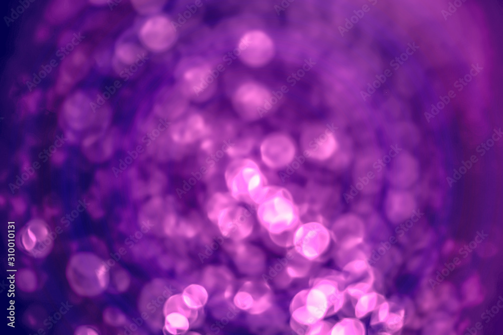 Abstract purple and white bokeh with black background defocused. Abstract purple and white bokeh with black background defocused.