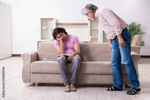 Young student and his father