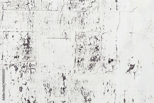 Obraz na płótnie White paint pealing off a wall makes an interesting texture to use as background