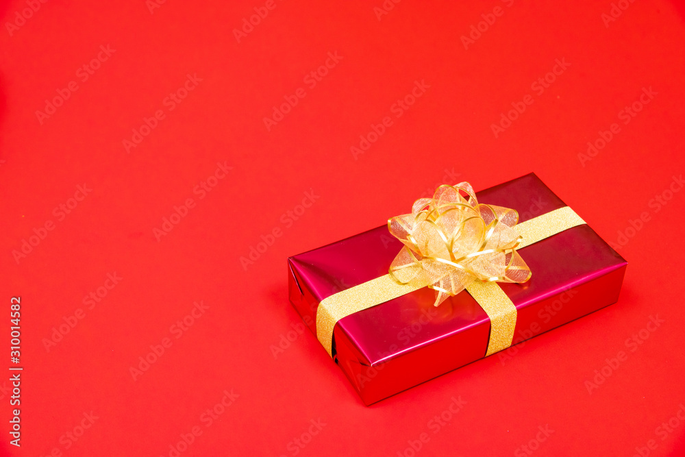 Christmas background concept. Top view of Christmas gift box gold balls with spruce branches Christmas background concept. Top view of Christmas gift box gold balls with spruce branches
