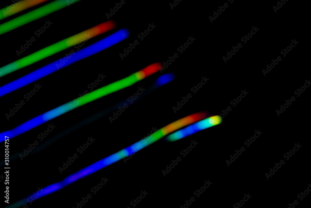 Fototapeta premium Holographic background with different colors. Holographic lines on black background. Neon line. overlay layer.