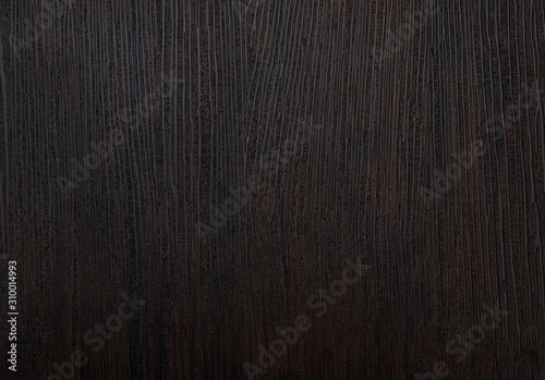 Dark wooden surface textured pattern - front view