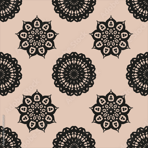Seamless ethnic pattern with floral motives. Mandala stylized print template for fabric and paper. Boho chic design. Summer fashion.