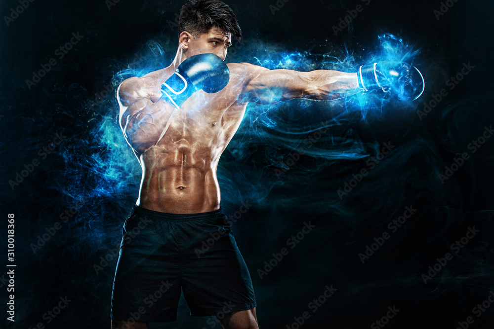 Boxing and fitness concept. Boxer man fighting or posing in gloves on black background. Individual sports recreation. Energy and power.