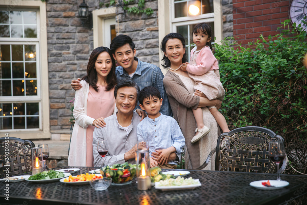 Happy family dinner in the garden Happy family dinner in the garden