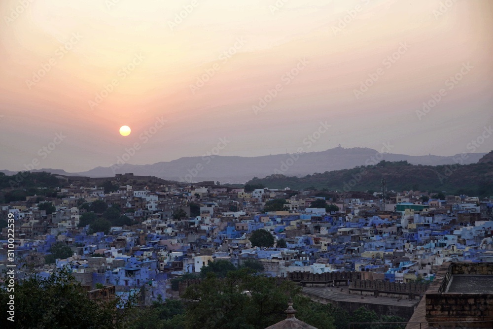 The sunset over the blue city of India