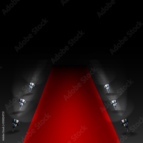 Red carpet with spotlights. Dark background.