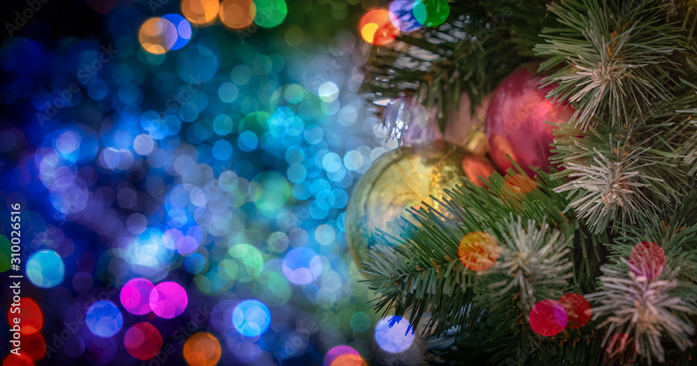 Christmass tree and many bokeh lights on the background.