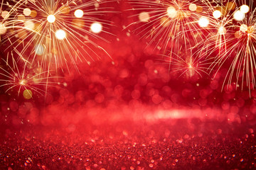 Red and Gold Vintage Fireworks and bokeh in Christmas and New Year copy space. Abstract background holiday.