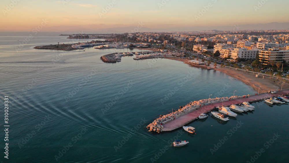 Aerial drone photo of port of famous district of South Athens riviera - Glyfada at sunset, Attica, Greece