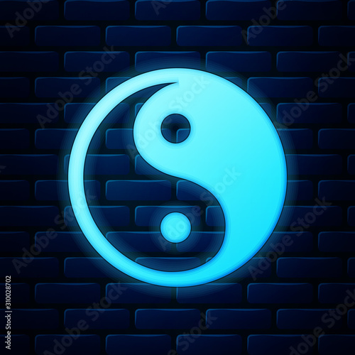 Glowing neon Yin Yang symbol of harmony and balance icon isolated on brick wall background. Vector Illustration
