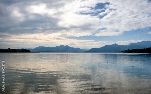 View of Chiemsee lake with mountains on the horizon. Bavaria, Germany