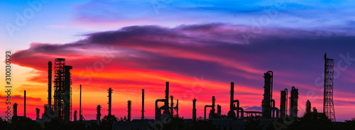 Industrial Estate ,Refinery factory and oil storage tank,petrochemical plant area with beautify sky at sunset