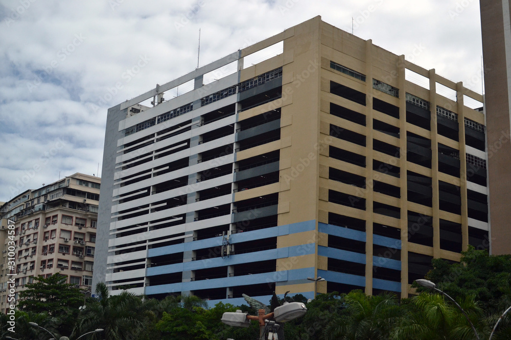 RIO DE JANEIRO, RIO DE JANEIRO, BRAZIL. 12 NOV 2019: A garage building is a building designed to function as parking for cars, motorcycles or other vehicles. RIO DE JANEIRO, RIO DE JANEIRO, BRAZIL. 12 NOV 2019: A garage building is a building designed to function as parking for cars, motorcycles or other vehicles.