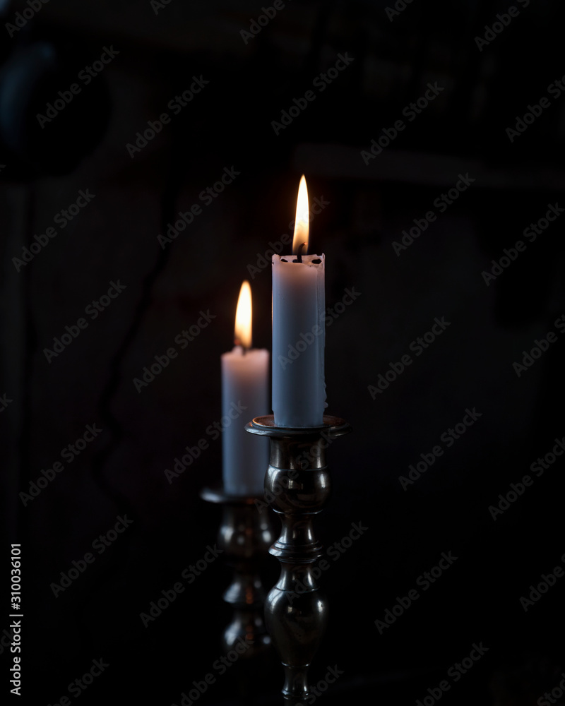 Candles in candlesticks Candles in candlesticks