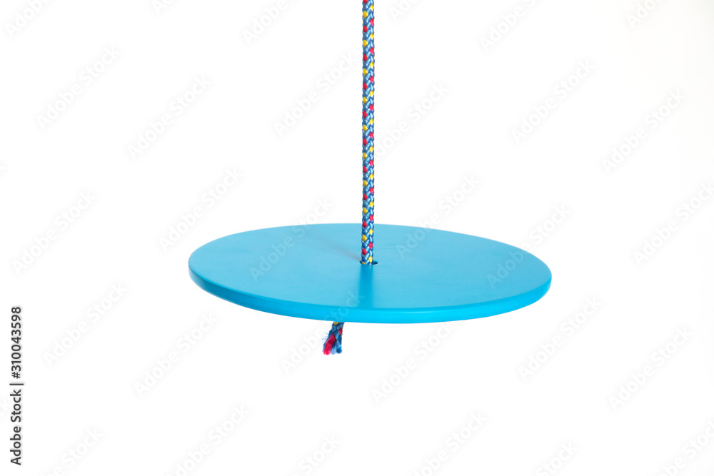 Closeup of plastic disc swings on white Closeup of plastic disc swings on white