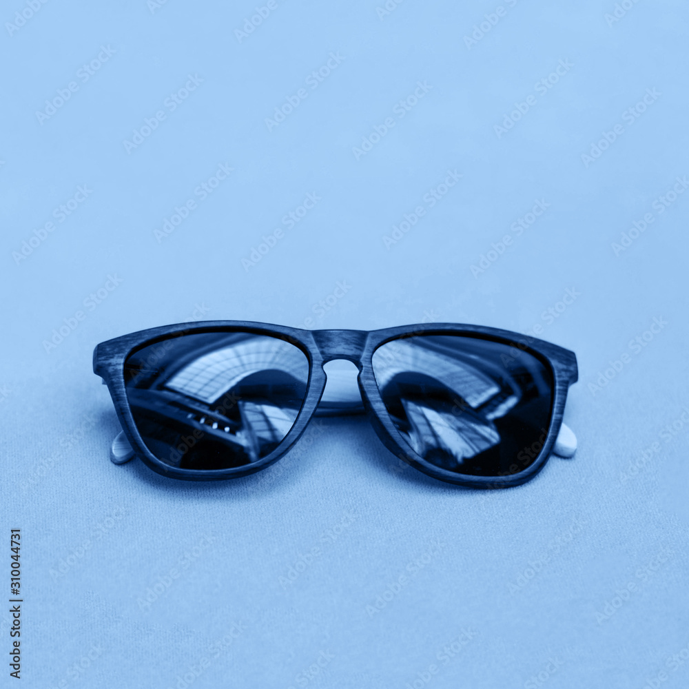 Sunglasses on blue background. Sunglasses on blue background.