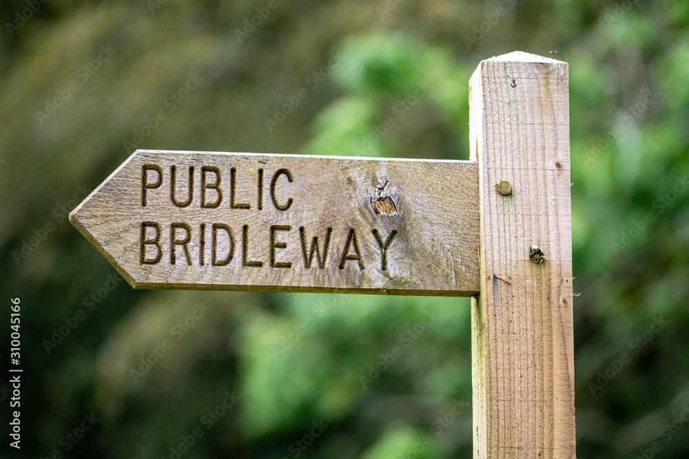 Public bridleway wooden sign post