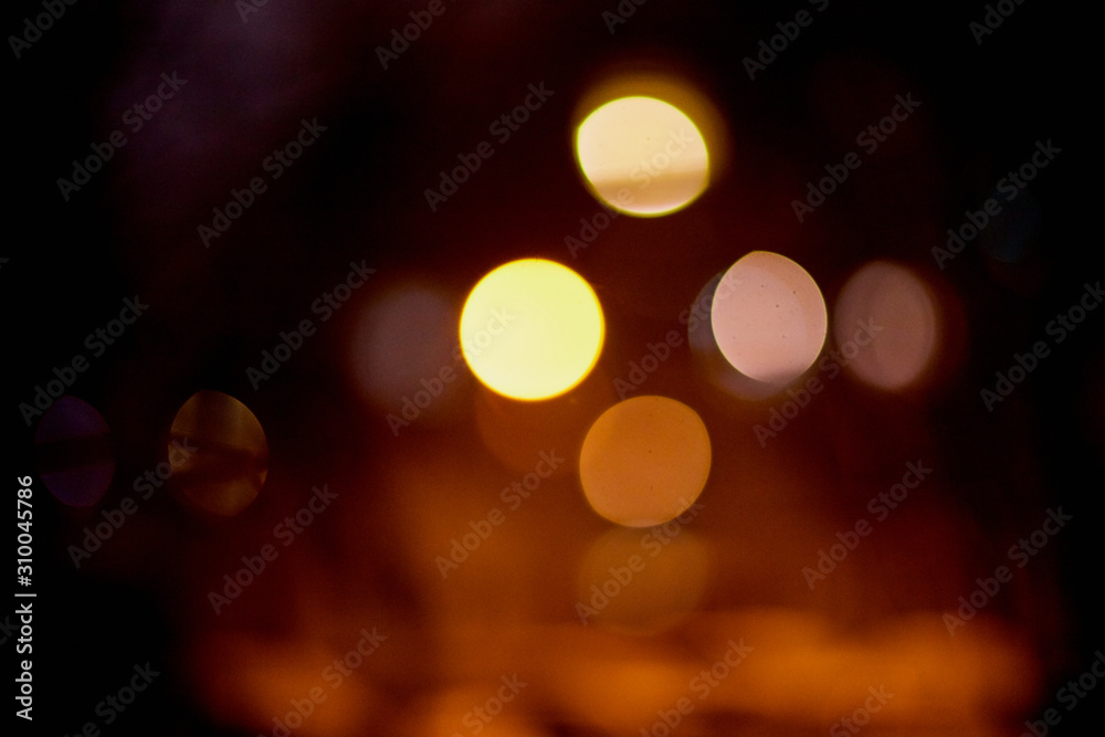 Obraz premium Abstract texture with light bokeh and black background