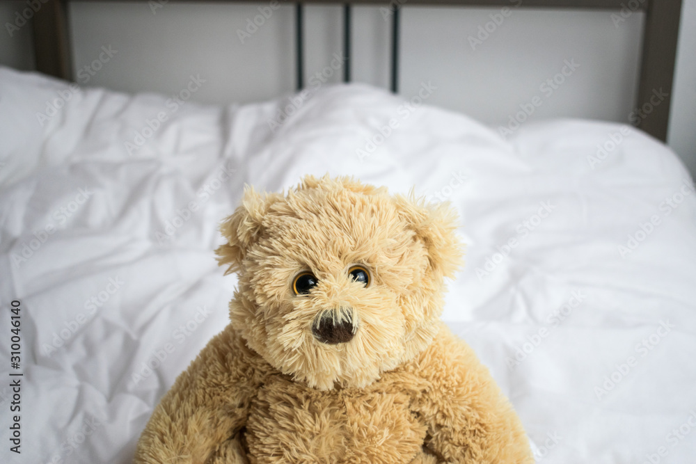 sleep kids problems bear sit on bed closeup concept