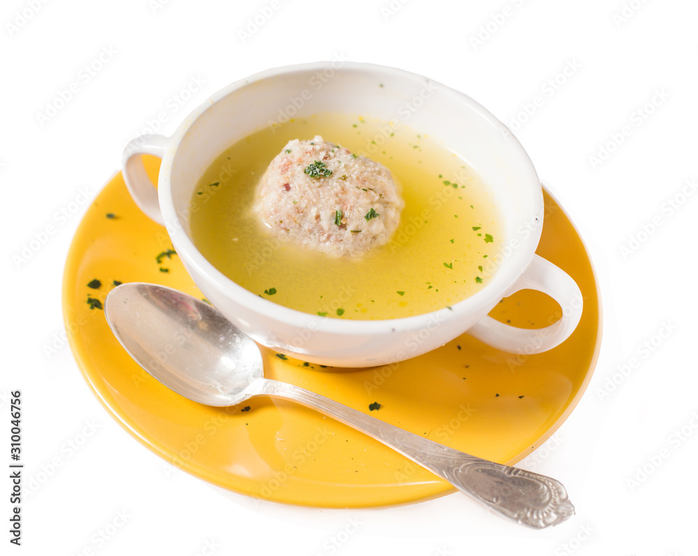 canederli in broth isolated on white canederli in broth isolated on white