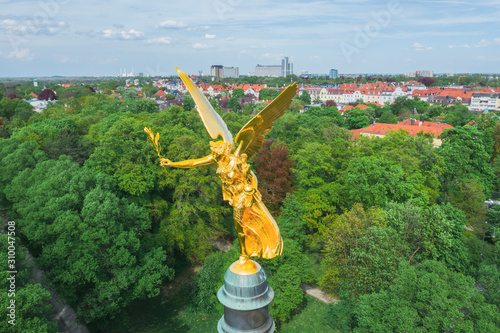 Germany, Bavaria, Munich, Aerial view of gold colored?Angel of Peace monument photo