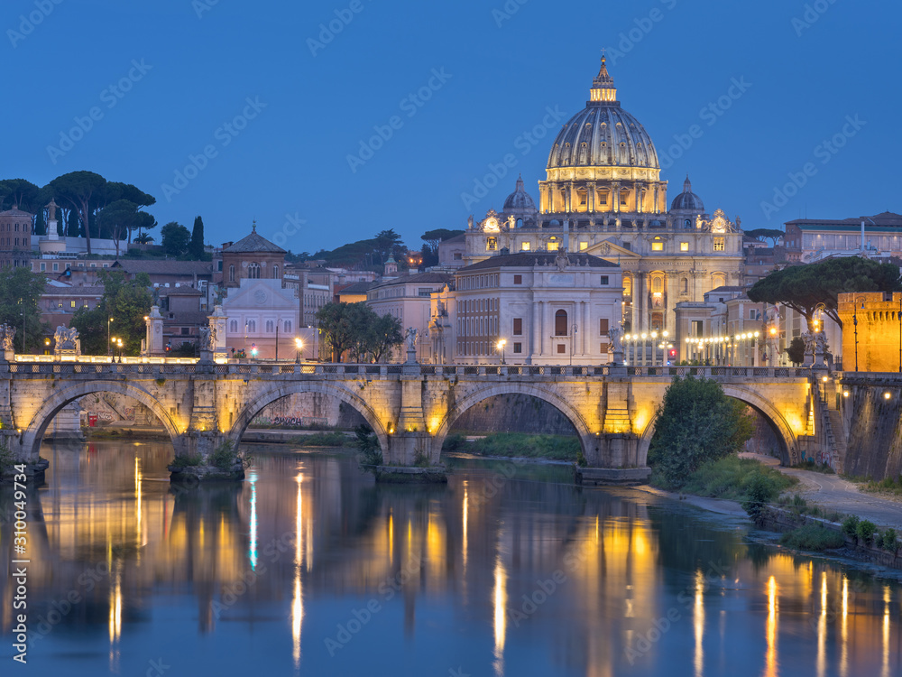 beautiful twilight lights on the bridge and St Peter Cathedral in Vaticano