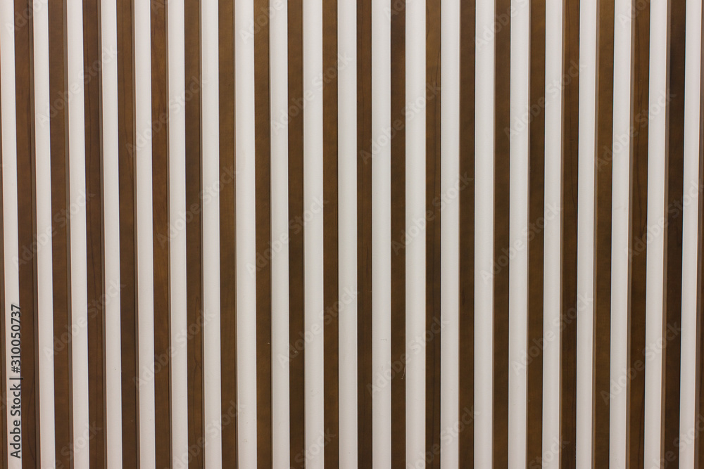 Wooden slats on floor or wall in vertical parallel pattern, background panel texture, horizontal image Wooden slats on floor or wall in vertical parallel pattern, background panel texture, horizontal image