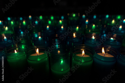 Close-up of blue and green candles