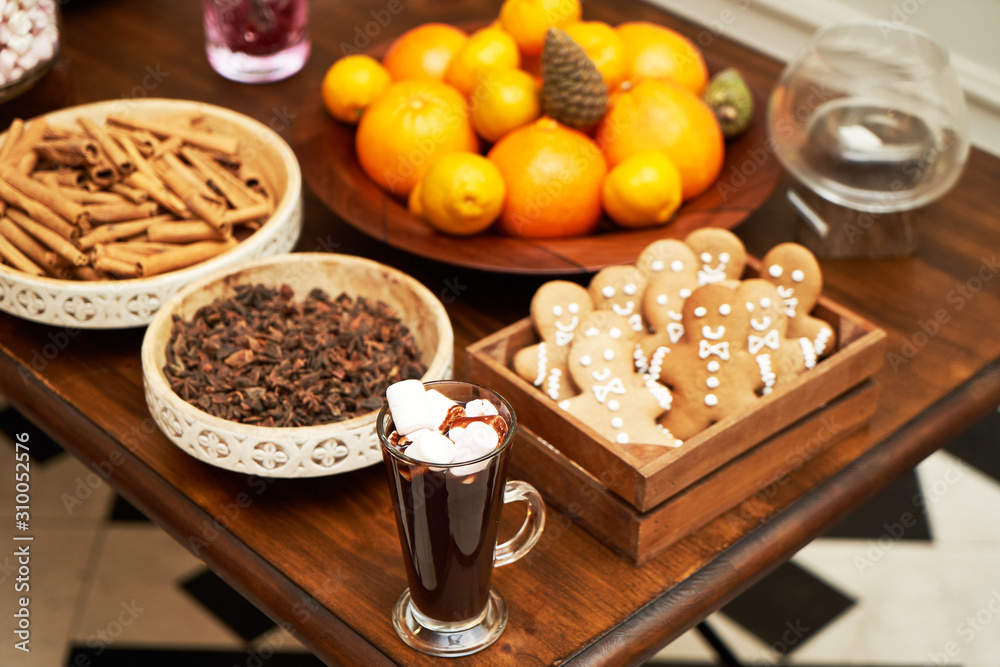 Christmas festive table with dessert cookies in shape of gingerbread man