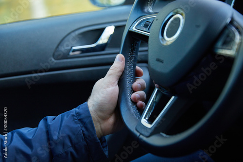 Fotografie, Tablou Male driver hands holding steering wheel