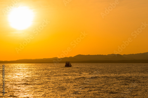 Sunset at sea. toned. copy space © jollier_